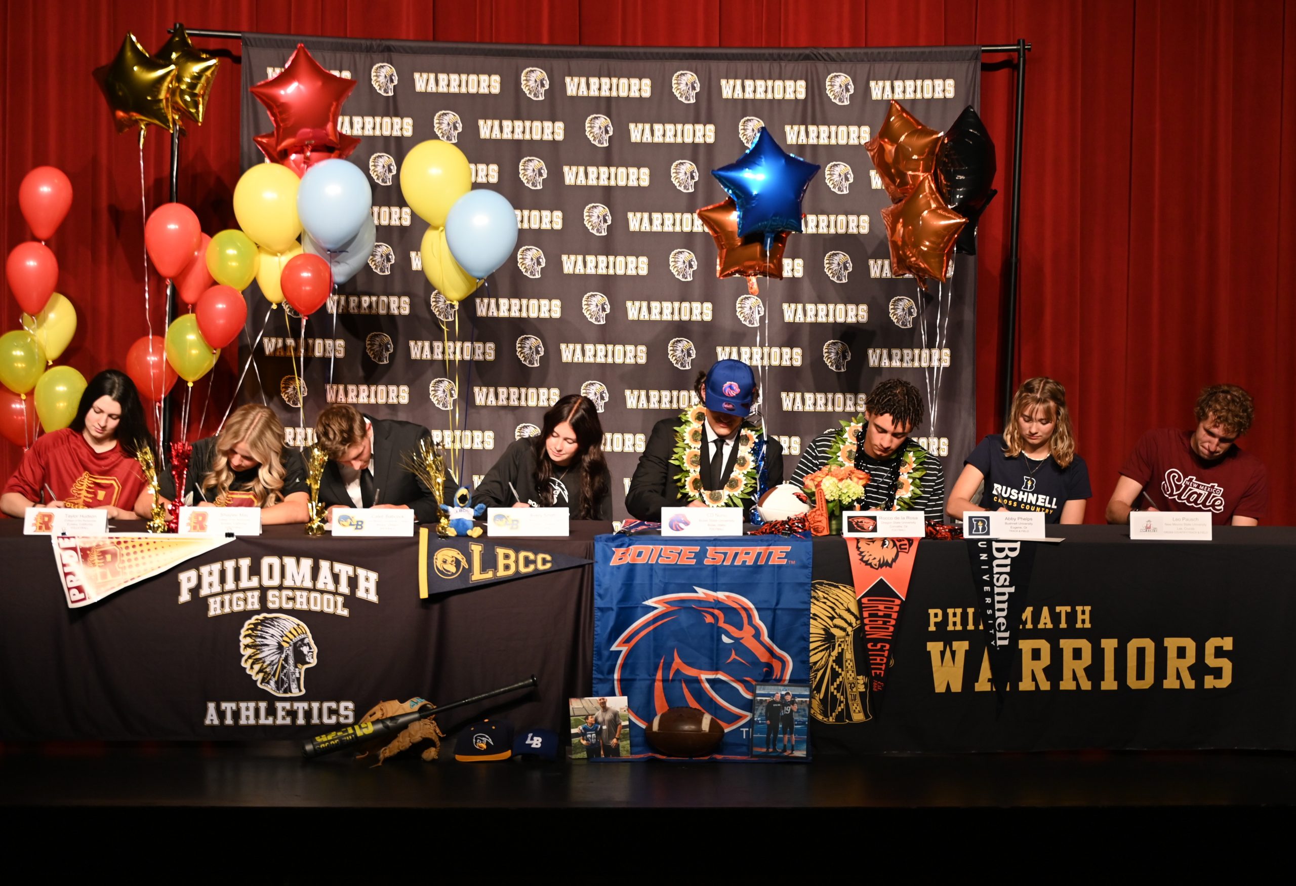 Philomath seniors celebrate college athletic commitments in signing ceremony