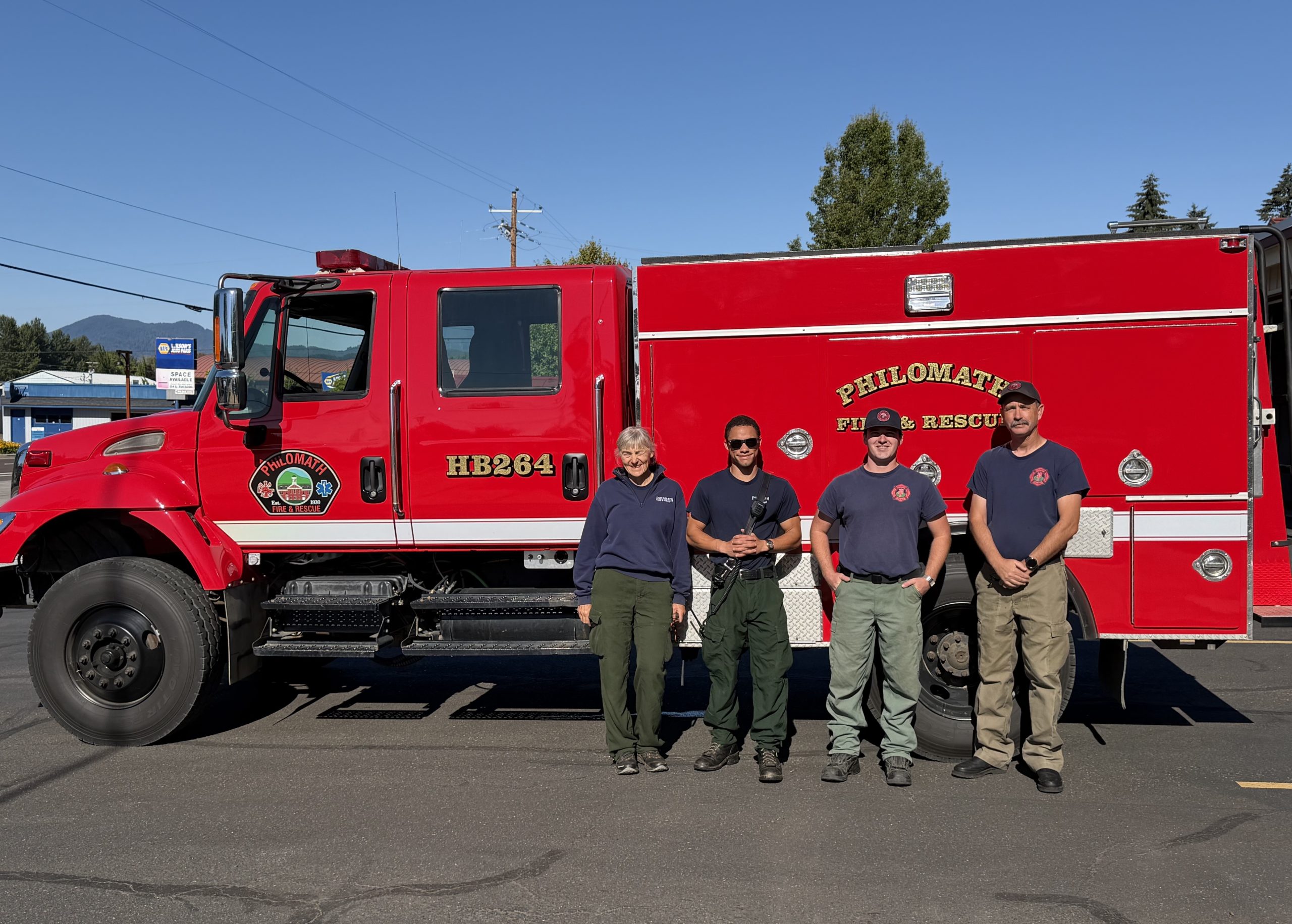 Philomath Fire and Rescue crew protecting structures at East Evans Creek Fire